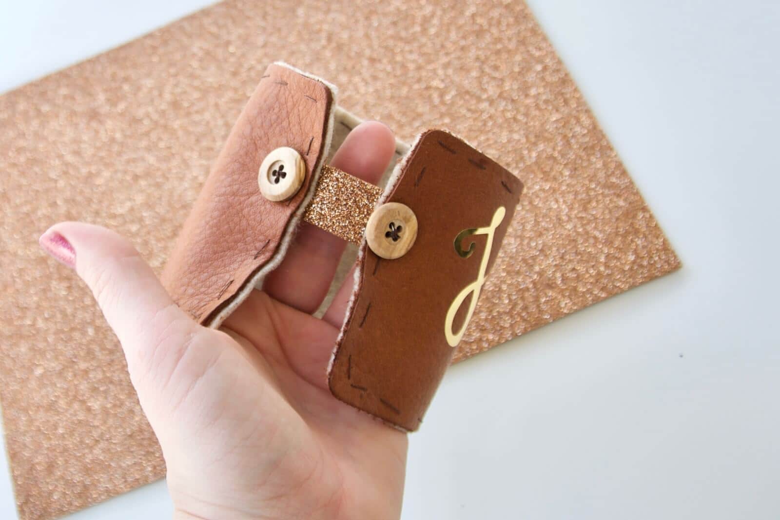 sew on two buttons