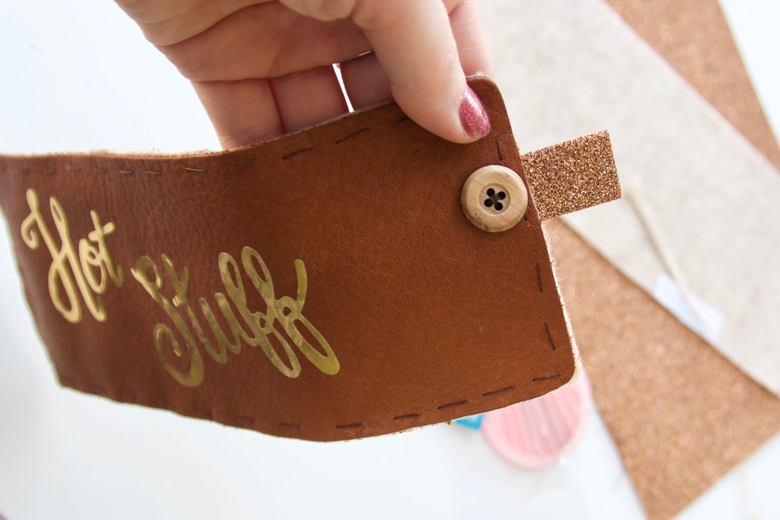 sew on two buttons