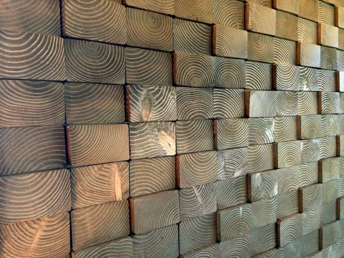 Another wonderful woodsy wall idea is to slice boards into 1-2